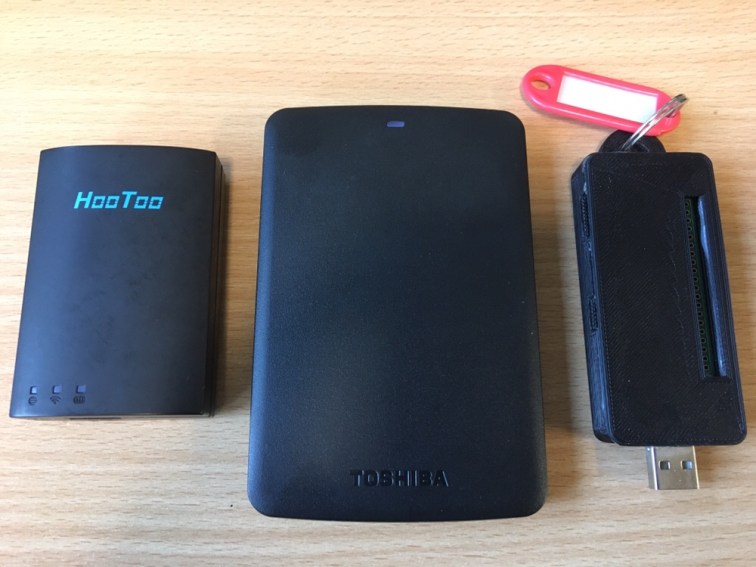 Photo of travel router, hard drive and Raspberry Pi Zero W